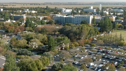 Aerial: flying over UC Davis campus in Davis, California, USA. Stock Footage 119985143