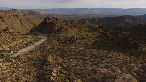 Aerial, Flying Toward Rugged Mountain in California Desert Stock Footage 146755553