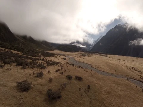 Aerial Flying Towards Clouds By Mount Cook, New Zealand Stockbeeldmateriaal 85309022