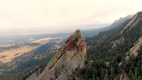 Aerial flying zoom into flat irons rock mountains at chautauqua park in Boulder  Stock Footage 102683553