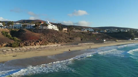 Aerial flyover above Morro Jable - Coast of Fuerteventura Canary Islands 動画素材 335509253