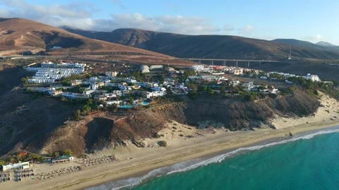 Aerial flyover above Morro Jable - Coast of Fuerteventura Canary Islands Видео 335509268