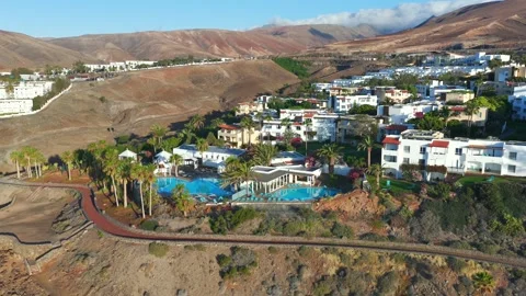 Aerial flyover above Morro Jable - Coast of Fuerteventura Canary Islands Видео 335509287