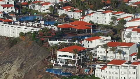 Aerial flyover above Morro Jable - Coast of Fuerteventura Canary Islands Video stock 335509300