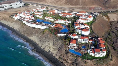 Aerial flyover above Morro Jable - Coast of Fuerteventura Canary Islands Video stock 335509317