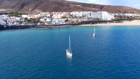 Aerial flyover above Morro Jable - Coast of Fuerteventura Canary Islands Video stock 335509444