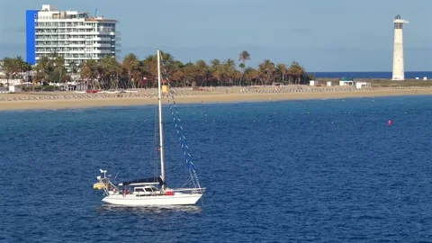 Aerial flyover above Morro Jable - Coast of Fuerteventura Canary Islands Видео 335509463