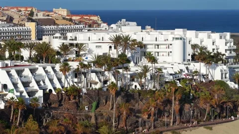 Aerial flyover above Morro Jable - Coast of Fuerteventura Canary Islands 動画素材 335509464