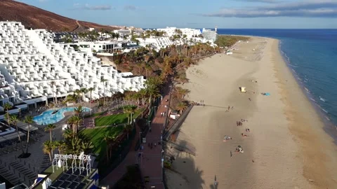Aerial flyover above Morro Jable - Coast of Fuerteventura Canary Islands Vídeo Stock 335509503