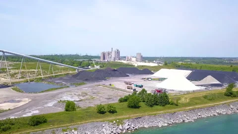 Aerial flyover of an aggregates mining operation Stock Footage 135485666