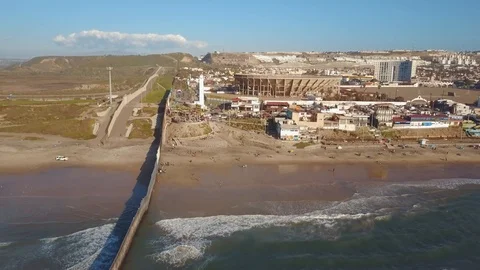 Aerial Flyover, Border Wall Separating Tijuana Mexico And The United Stock Footage 99433030