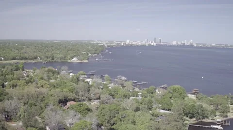 Aerial Flyover of Docks with City in Background Video stock 65377307