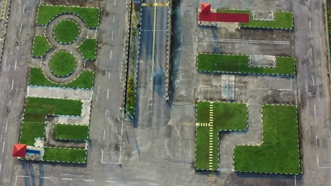 Aerial flyover the driving course of the training institution at Seri Stock Footage 276723840
