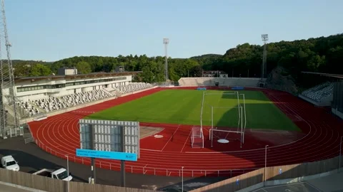 Aerial Flyover of Empty Rimnersvallen Athletics Stadium with Running Track in Stock Footage 333701853