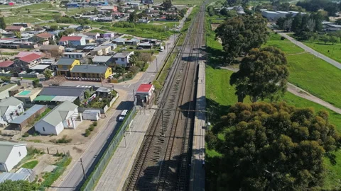 Aerial flyover: An empty, unmaintained railway line. UHD50p Stock Footage 247966388
