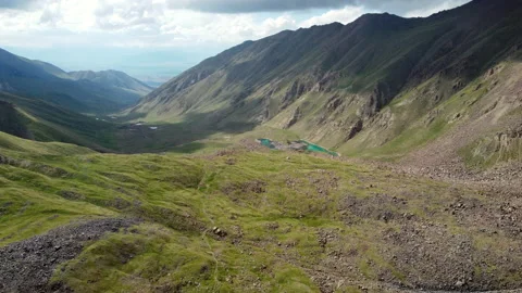 Aerial flyover of high mountain valley in Kyrgyzstan Stock Footage 197329161