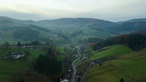 Aerial flyover of misty alpine valley in Altmunster, Austria, in autumn Stock Footage 331062025