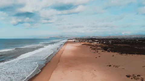 Aerial flyover next to beautiful ocean, Oxnard CA Stock Footage 101667245