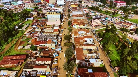 Aerial flyover poor Kitale Slum and modern skyline of Kitale rural urban area Stockbeeldmateriaal 333018849