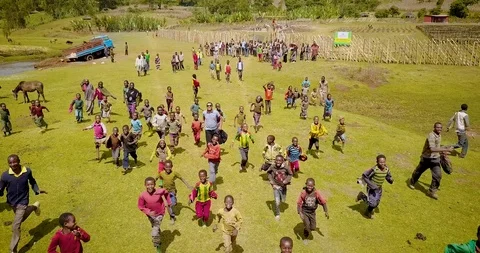 A group of african children playing in a park