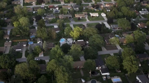 Aerial Flyover Of Suburban Homes Stock Footage