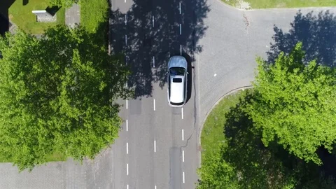 Aerial following car top-down view this grey colored station wagon 4k Stock Footage 76197335