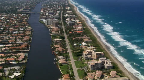 Aerial following channel along Boca Raton, Florida coastline Stock Footage 59498608