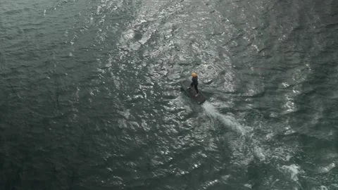 Aerial Following Shot of E-Foil Rider Near Fornells, Menorca, Spain Stock-Footage 344417432