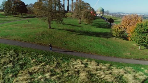 Aerial footage above Calton Hill on a bright Autumn day. Stock Footage