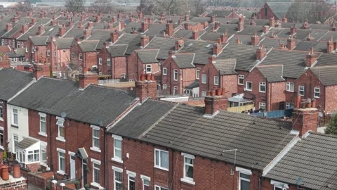 Aerial footage above rows of back to back terraced houses in UK Vídeo Stock 305945024
