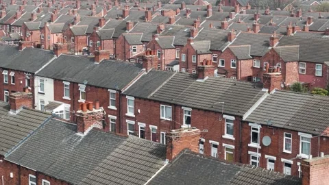 Aerial footage above rows of back to back terraced houses in UK Vídeo Stock 306015588