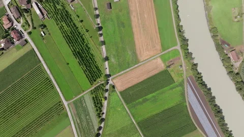 Aerial footage of Austrian fields with intersecting paths Stock Footage 264009877