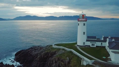 Aerial footage of beautiful lighthouse on a cliff in Fanad, Ireland Stock Footage 90083553