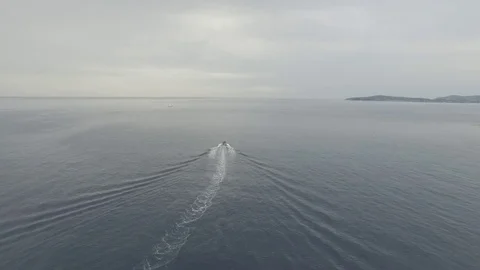 Aerial footage of boats swimming over the sea Stock Footage