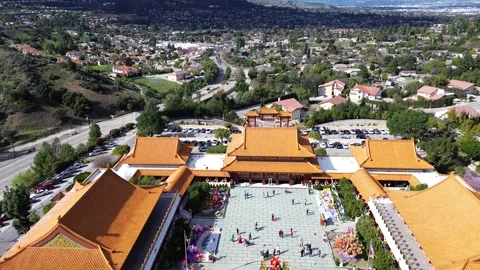 Aerial footage of Buddhist temple complex Stock Footage 264076053