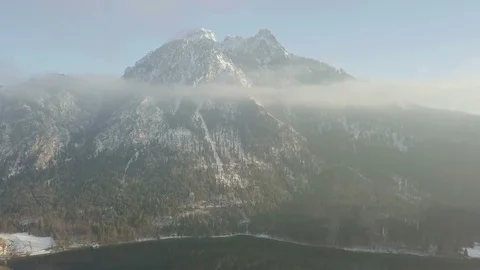 Aerial footage camera flight through the cloud cutting the mountain view Stock Footage 86136885