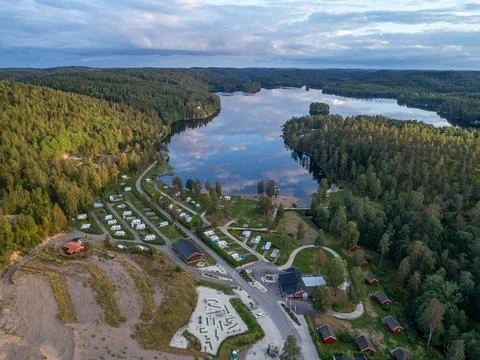 Aerial footage campsite camping caravan by lake Ragnerudssjoen in Dalsland Sw Stock Photos