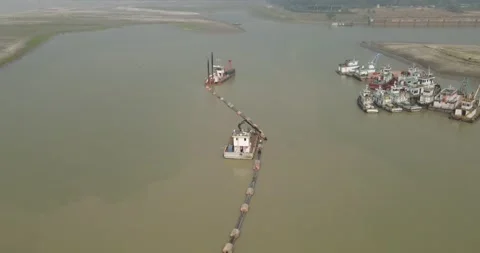 Aerial footage capturing a river dredging operation Stock Footage 325135690