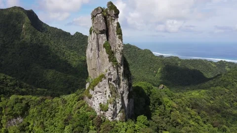 Aerial footage circling around the needle, Rarotonga Stock Footage