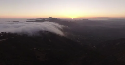 Aerial footage of clouds falling over Malibu Beach, California Stock Footage 70479523