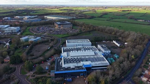 Aerial footage of a Data center facility in Wiltshire, UK Stock Footage 321776508