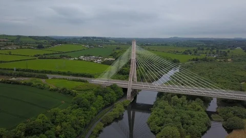 Aerial footage, drone pulling back slowly from a Cable bridge over a river Stock Footage 108919207