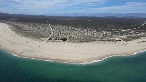 Aerial footage featuring the white sandy beach of Punta Arena. Stock Footage 336510109