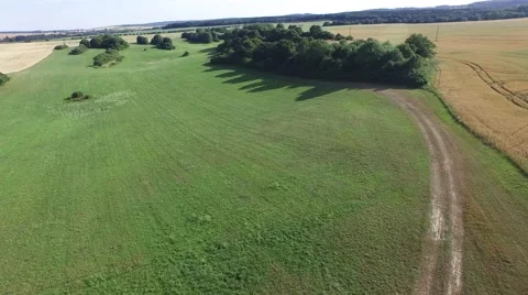 Aerial footage of a flight over fields Stock Footage 52154863