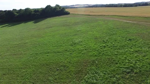 Aerial footage of a flight over fields Stock Footage 52154947