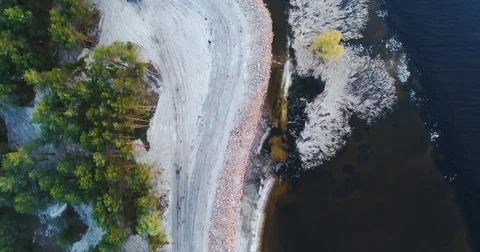 Aerial footage. Fly over coast at evening, vertical shot 스톡 동영상 75037553