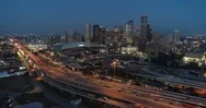 Aerial Footage - Flying Away From Early Morning Downtown Houston Stock Footage