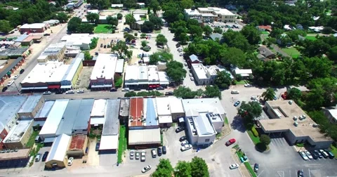 Aerial Footage - Flying parallel to Main St. in Old Town Bastrop, TX Video stock 67203722