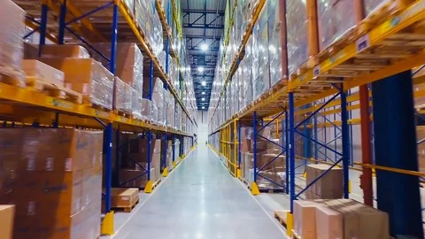 Aerial Footage Forklift Trucks Loads In The Rack Inside warehouse Stock Footage
