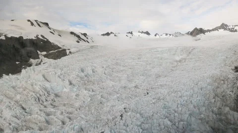 Aerial footage of Fox Glacier in New Zealand Stock Footage